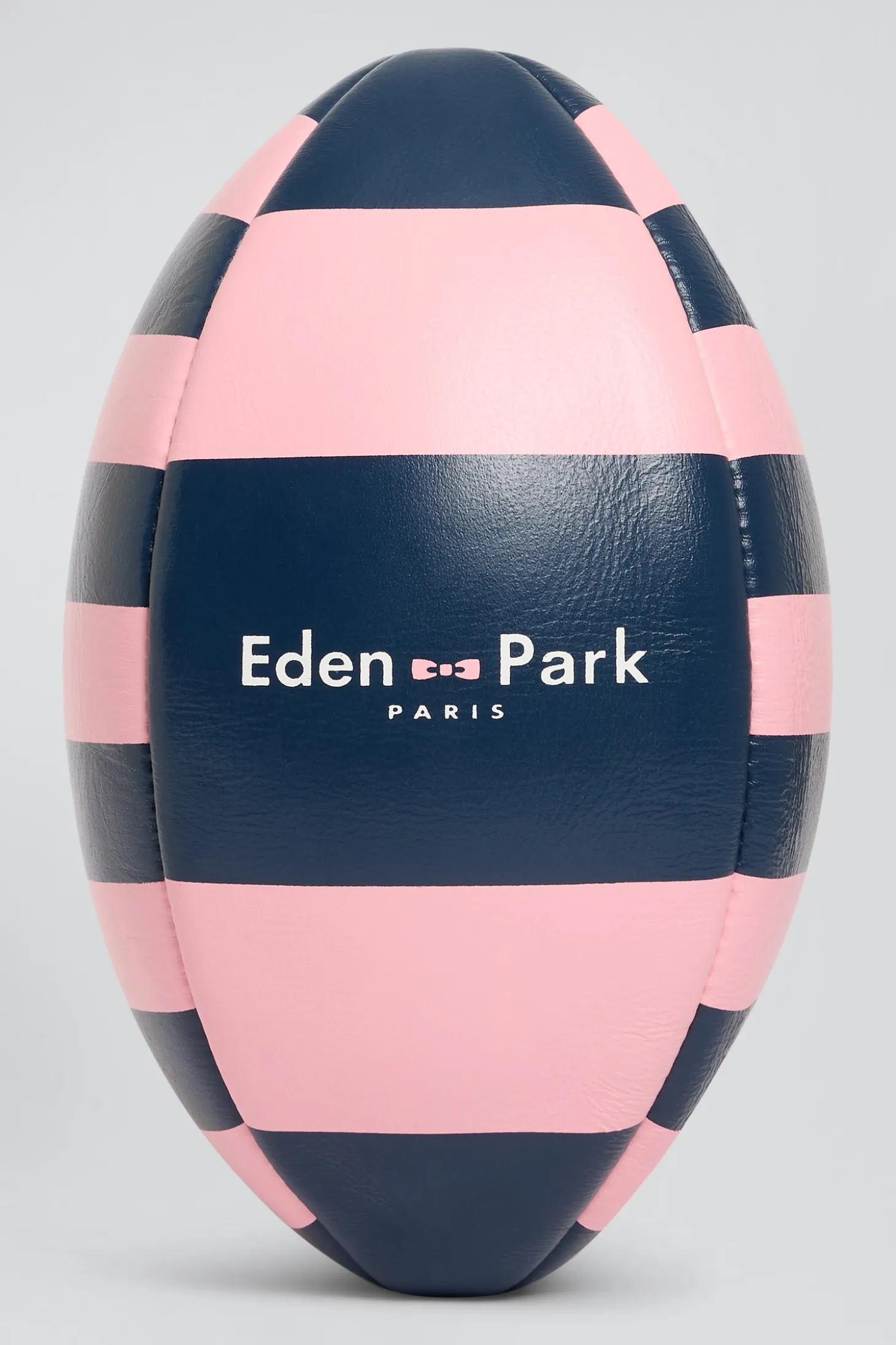 Ballon de rugby en cuir rose à quartiers cerclés