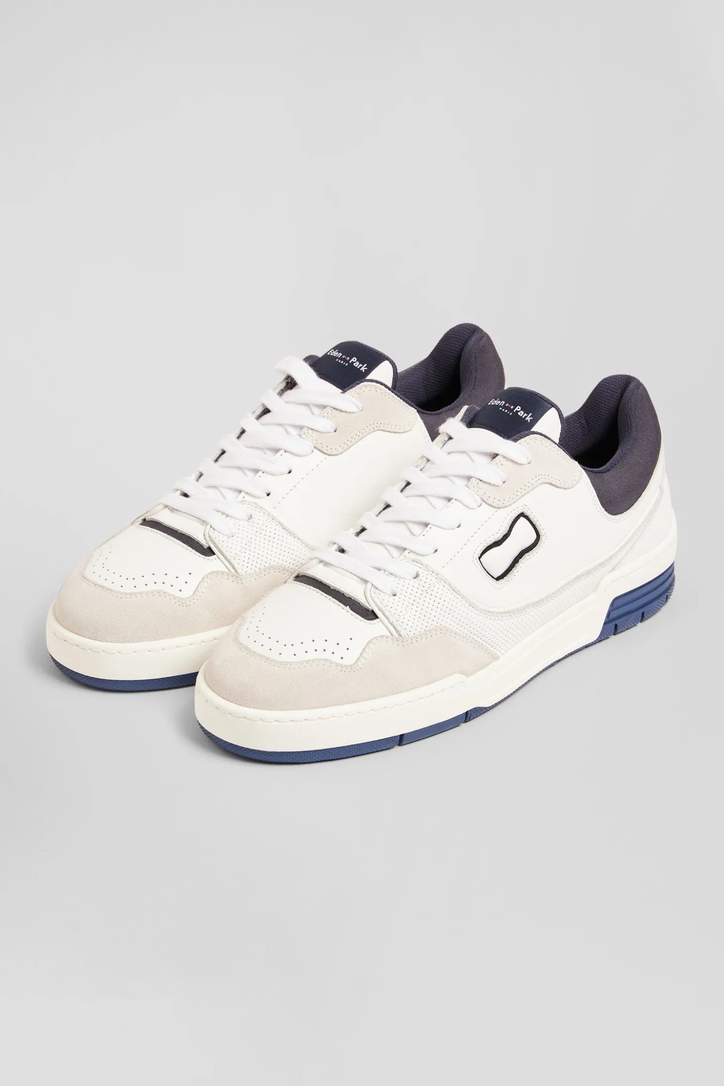 Basket en cuir blanches et bleu marine EP10
