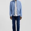 Cardigan zippé à col montant uni ciel en coton