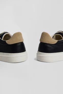 Paire de baskets basses en cuir bleu marine