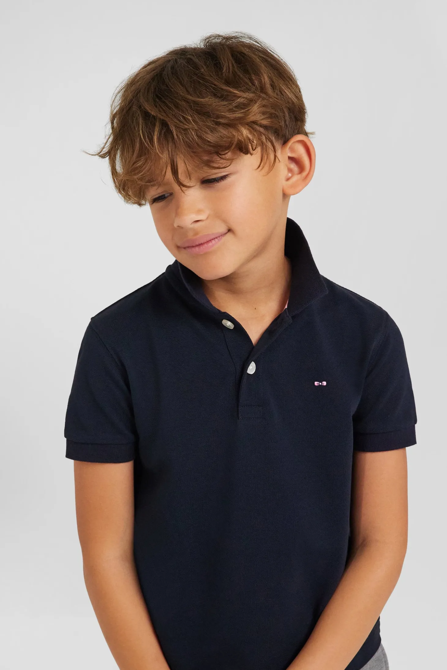 Polo manches courtes en piqué coton bleu marine col jacquard coupe Regular