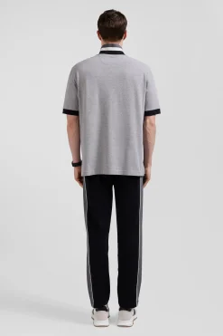 Polo manches courtes en piqué coton noir détails tricolores coupe Oversized