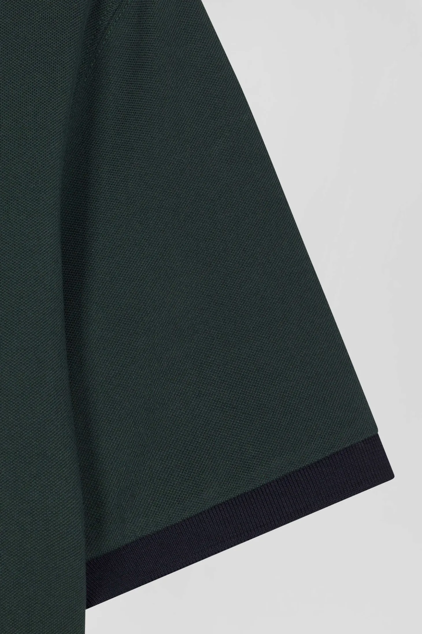 Polo manches courtes en piqué coton vert broderie cerclée coupe Regular
