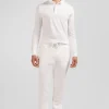 Polo manches longues en piqué coton écru coupe Slim