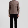 Polo manches longues en piqué coton marron écusson gomme coupe Regular