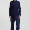 Polo manches longues en piqué coton bleu marine col jacquard écusson gomme coupe Regular