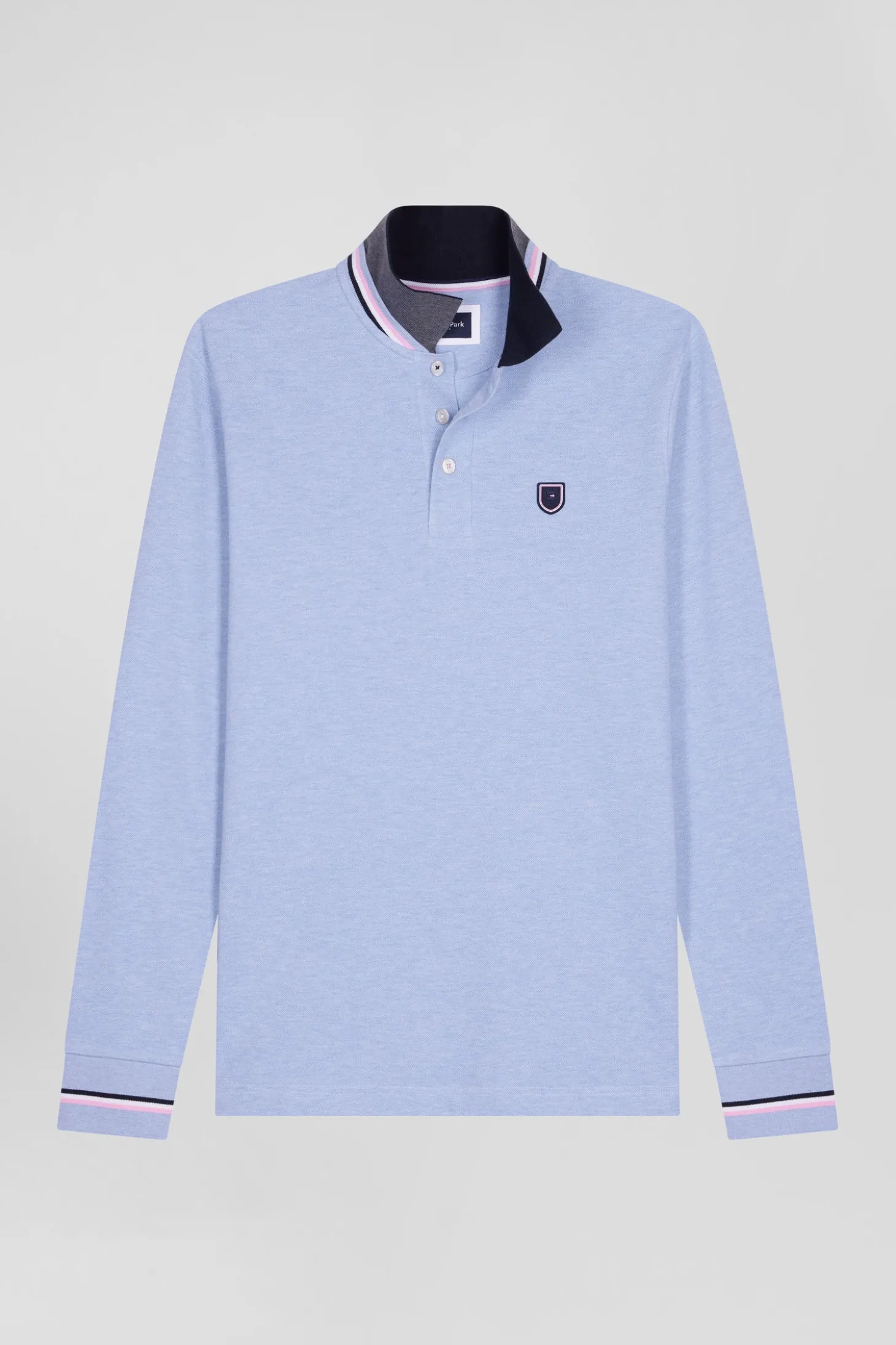 Polo manches longues en piqué coton ciel écusson gomme coupe Regular