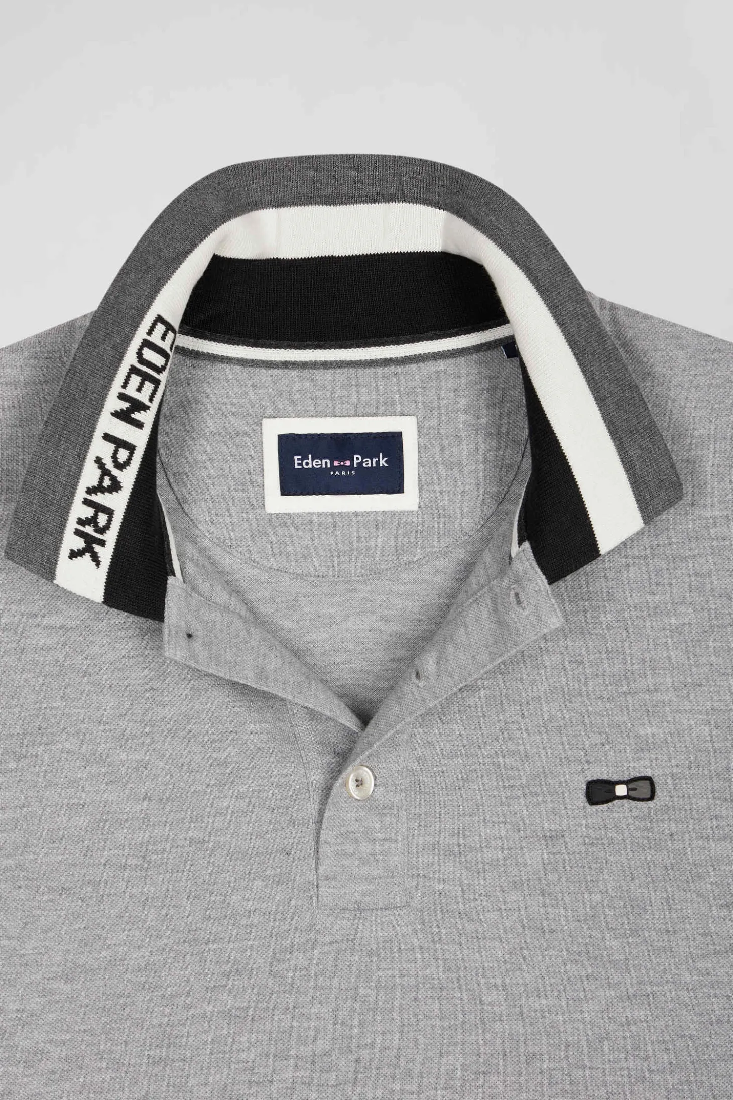 Polo manches longues en piqué coton bicolore noir col jacquard coupe Regular