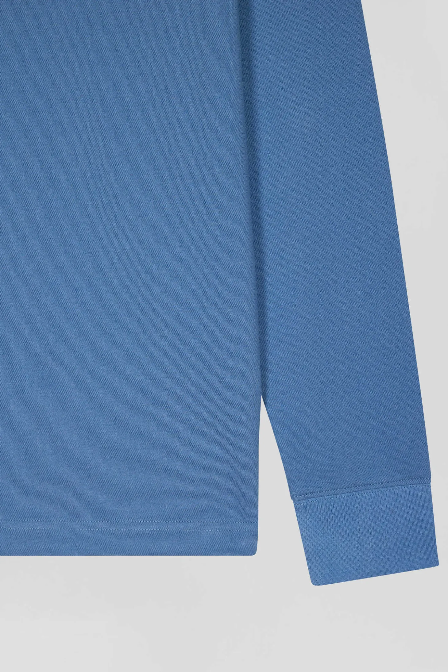 Polo manches longues en piqué coton bleu coupe Slim
